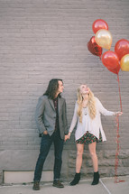 couple and balloons 