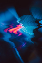 blue and pink on black abstract background 