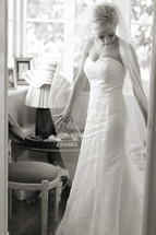 Bride wearing gown and veil preparing for marriage wedding  elegant