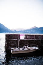 a docked boat on Lake Como 
