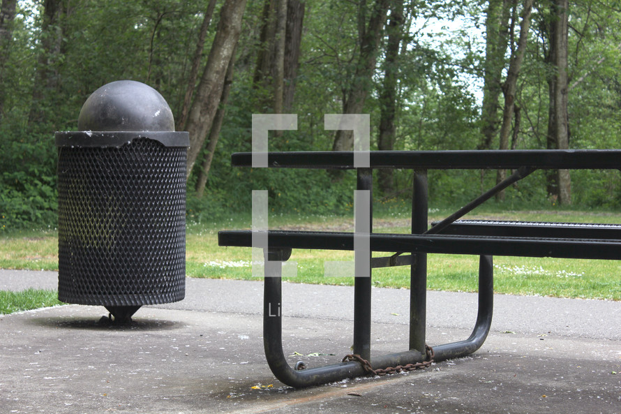park table and trash can 