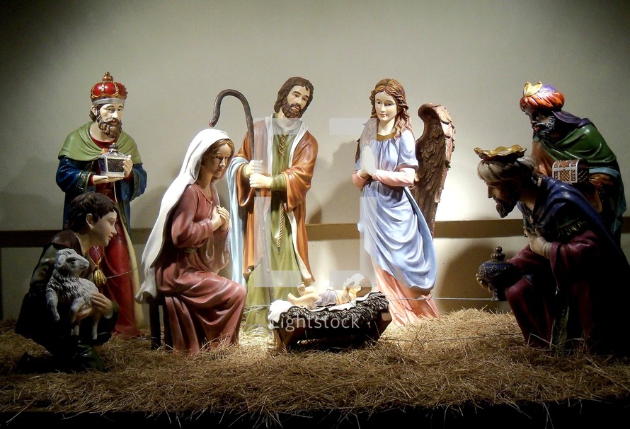 A very familiar nativity scene showing the birth of Jesus in a manager surrounded by Joseph, Mary, the three wise men and animals that come to adore the baby Jesus and celebrate his birth. A star shown in the sky to bring the wise men to see Jesus, the light of the world. 