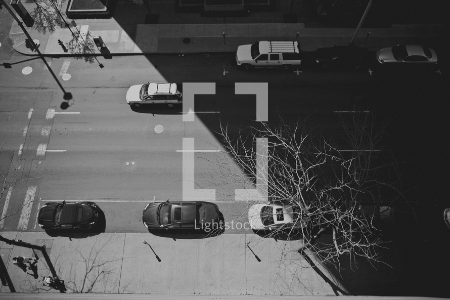 rooftop view of cars on a street