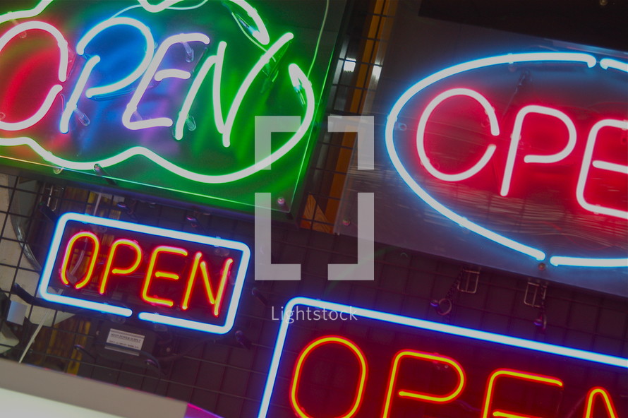 neon "open" signs