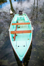 a boat floating on a pond in France 