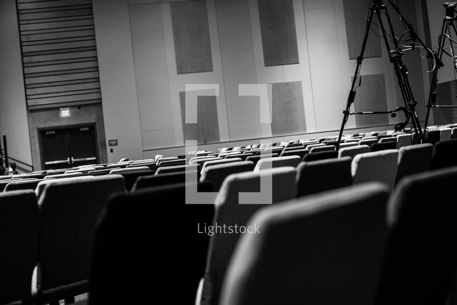 rows of seats in an auditorium 