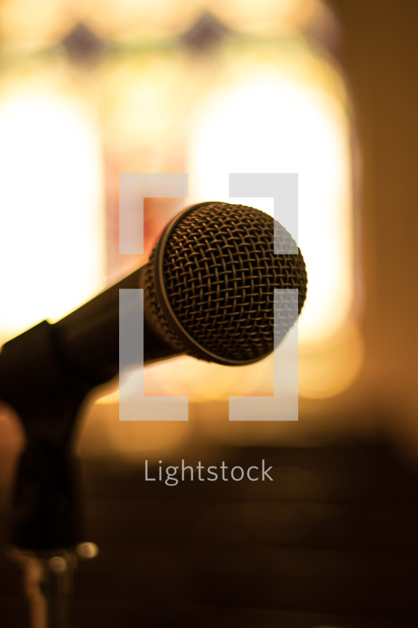 microphone and bright lights in a church 