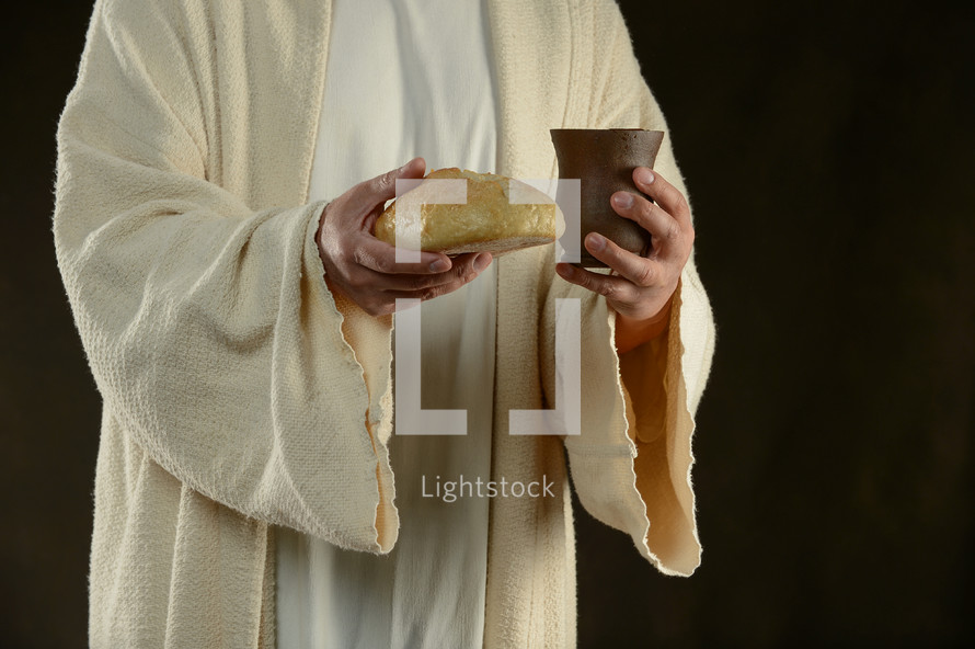 Jesus holding bread and wine 