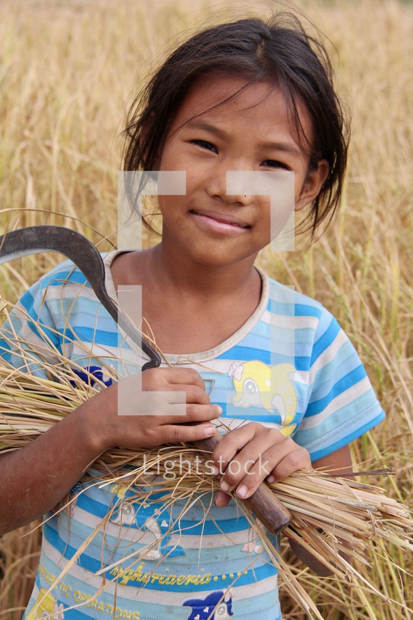 a girl in the fields in Nepal 