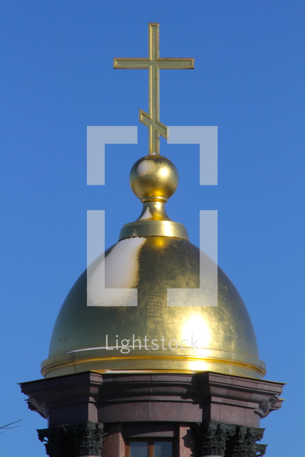 gold cross on a Russian Orthodox church steeple