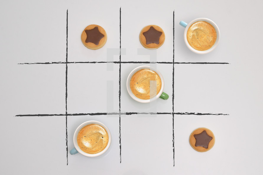 Game Of Tic-Tac-Toe from Cups of Espresso Coffee and Cookies