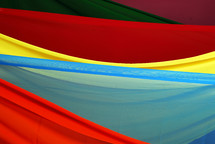 red, yellow, and blue fabric 