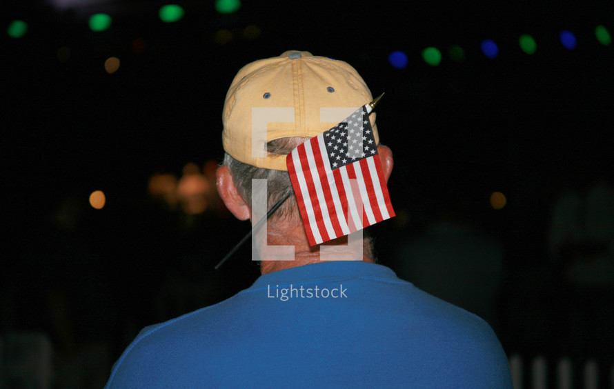 Man holding an American flag 