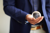 a man with a crystal ball 