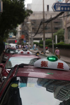 row of parked taxis in China 