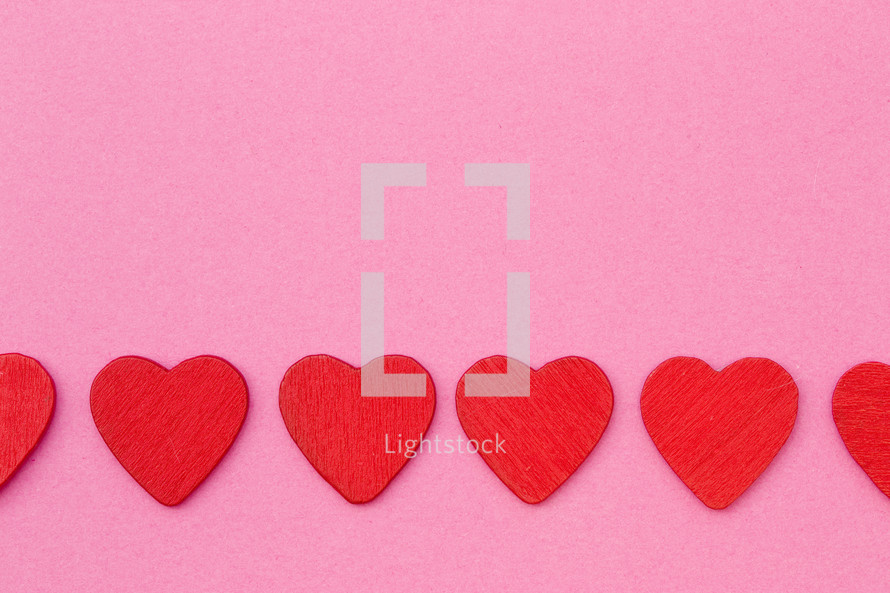 red hearts on pink 