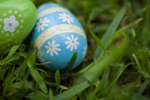 decorated Easter eggs in green grass