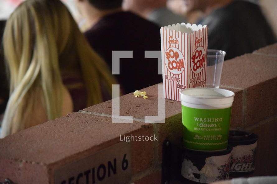 popcorn and beer at a football game 