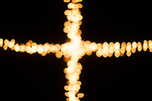 bokeh Christmas lights in the shape of a cross