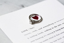 definition of love and an engagement ring 