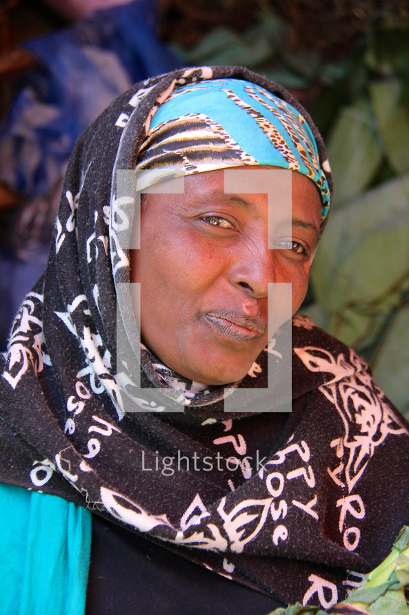 A shrouded Muslim Oromo woman  [For similar search Ethnic Smile Face]