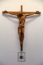 Wooden carving of a crucifix.