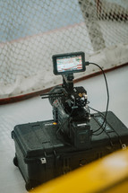 Cinema camera on church documentary set.