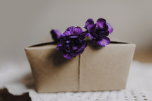 purple flower on a gift box 