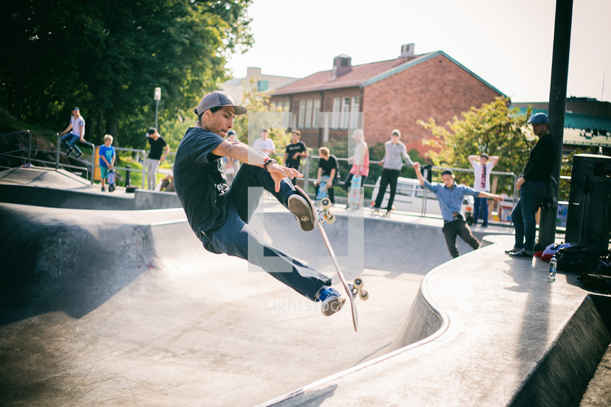 a man skateboarding in a skatepark 
