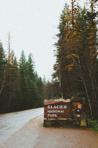 sign to the entrance for Glacier National Park 