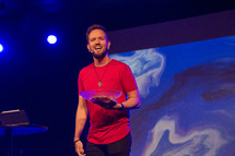 minister preaching during a worship service 