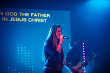 female singing during a worship service 