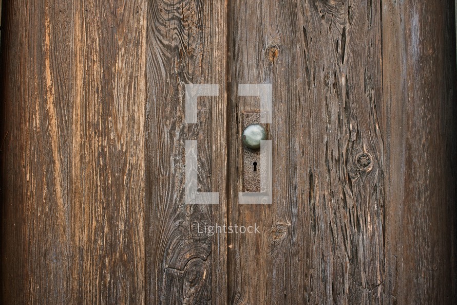 door knob on an old wooden door