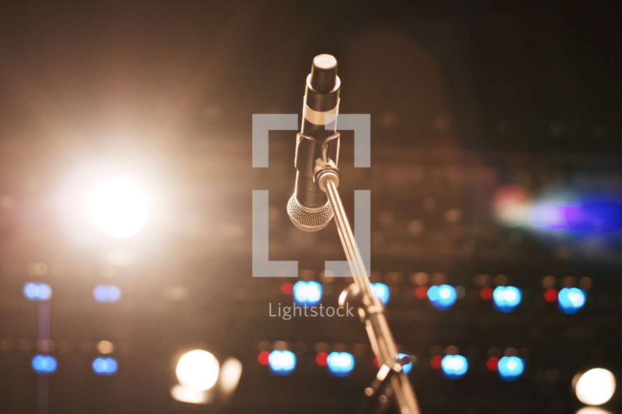 microphone on stage in the spot light