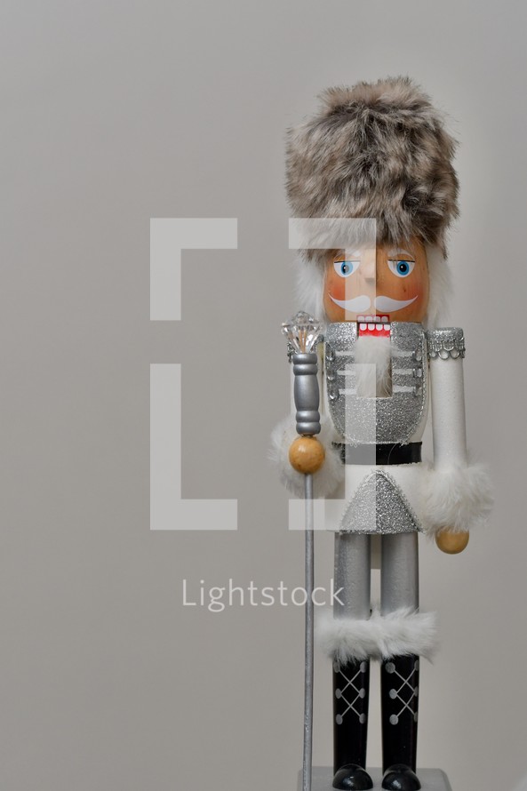 nutcracker against a white background with copy space 