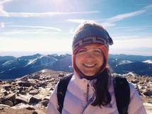 a smiling female hiker 