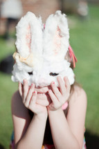 A child wearing a bunny mask 