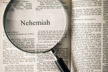 magnifying glass over Bible - Nehemiah 