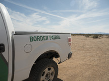 A US Border Patrol truck parked in the remote desert