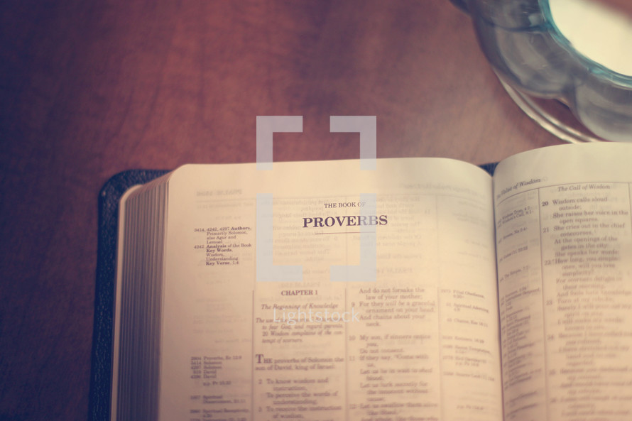 Bible opened to the book of Proverbs.