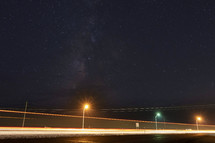 Stars above an interstate highway at night