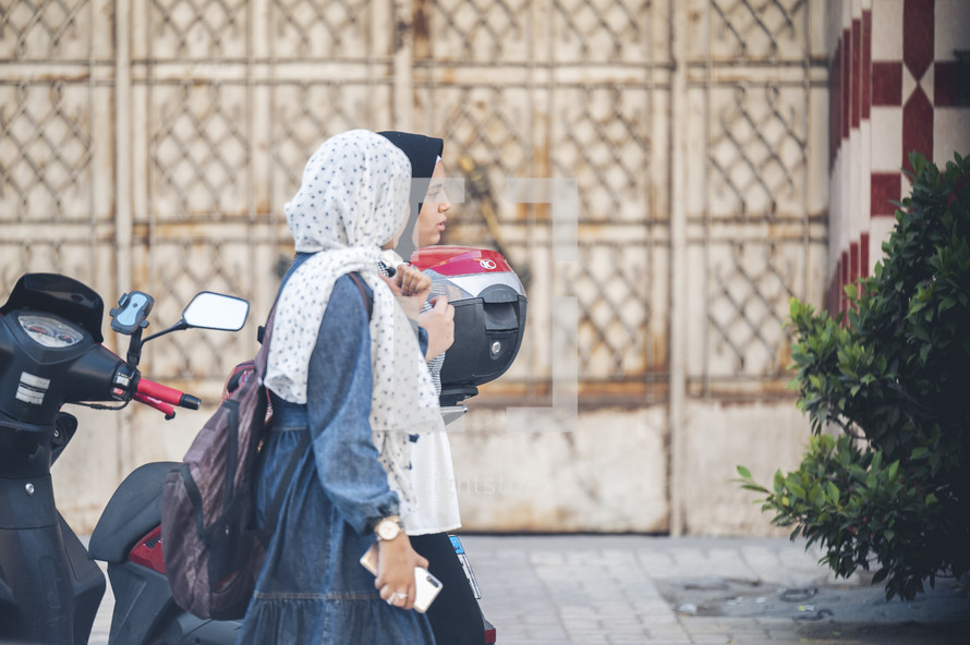 women walking on the streets of Egypt 