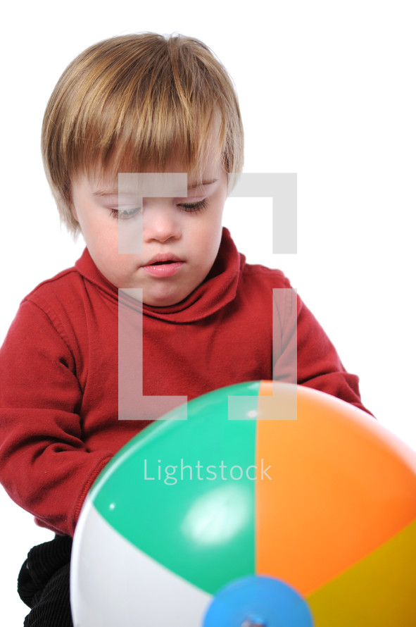 toddler boy and a beach ball 
