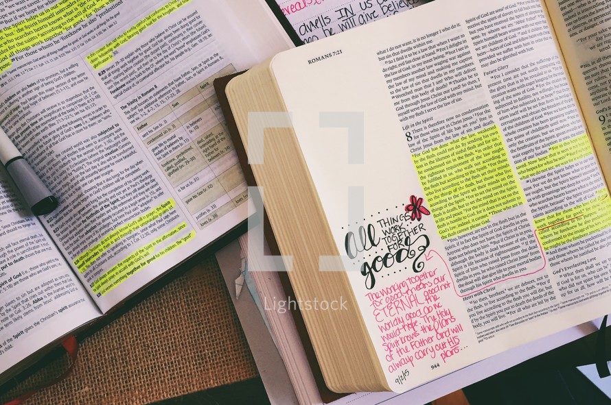 Open Bibles with yellow highlighted verses.
