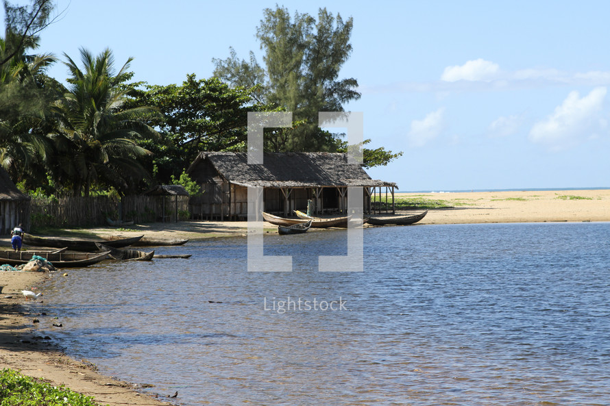huts on the shore of a beach 