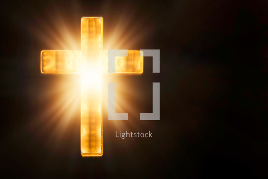Bright cross on a black background. Copy space. 
