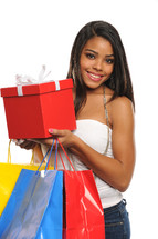 female shopper holding a gift box and shopping bags 