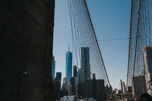 bridge cables and NYC skyline 