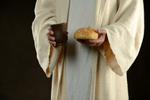 Jesus holding bread and wine 