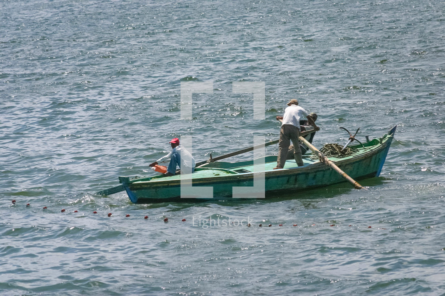 fishermen on a boat 